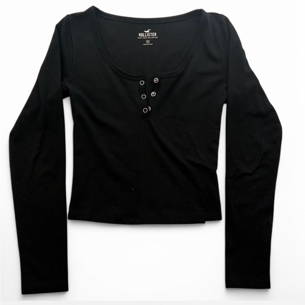 Black ribbed long sleeve henley top.